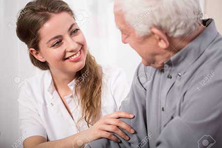 37522109-picture-of-smiling-nurse-assisting-senior-man