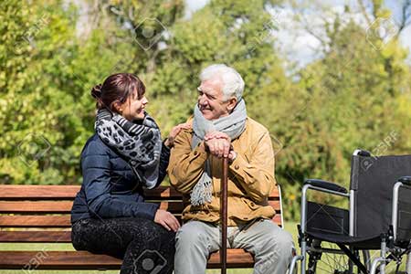 46637337-elder-man-and-carer-in-the-park